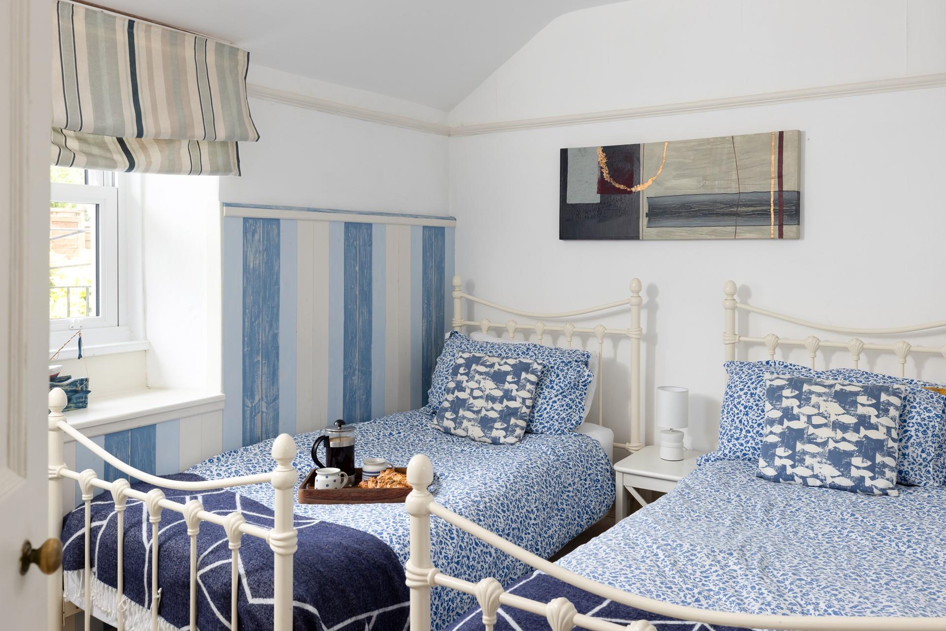 Bedroom 2 is decorated in a seaside style!