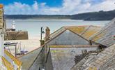 Bedroom 2 offers a glimpse of the sea across the quaint St Ives rooftops. - Thumbnail Image