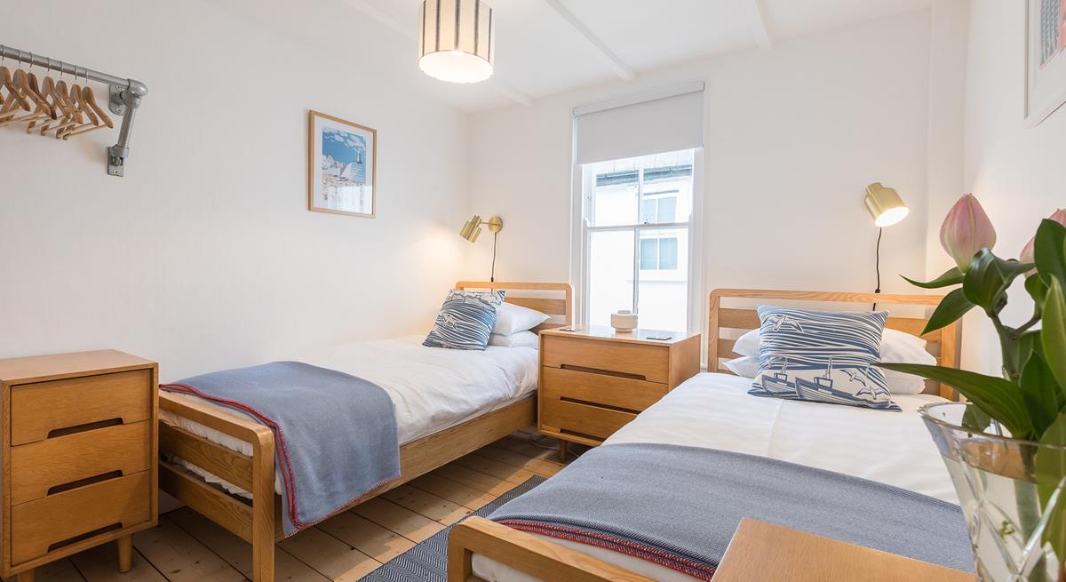 Twin rooms with classic furniture and minimalistic decor are perfect for both children and teenagers.