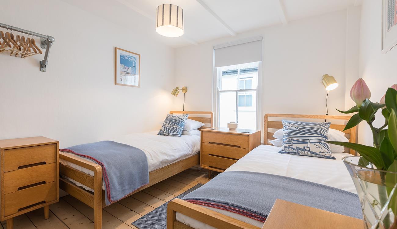 Twin rooms with classic furniture and minimalistic decor are perfect for both children and teenagers.