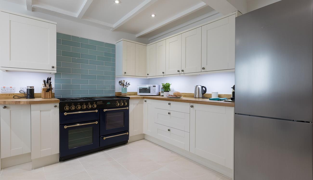 This gorgeous kitchen is sure to delight any budding chef!
