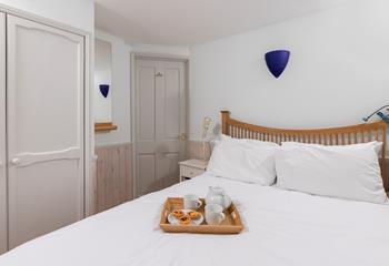 Simple and stylish, the bedroom is a relaxing space where you'll sleep soundly.