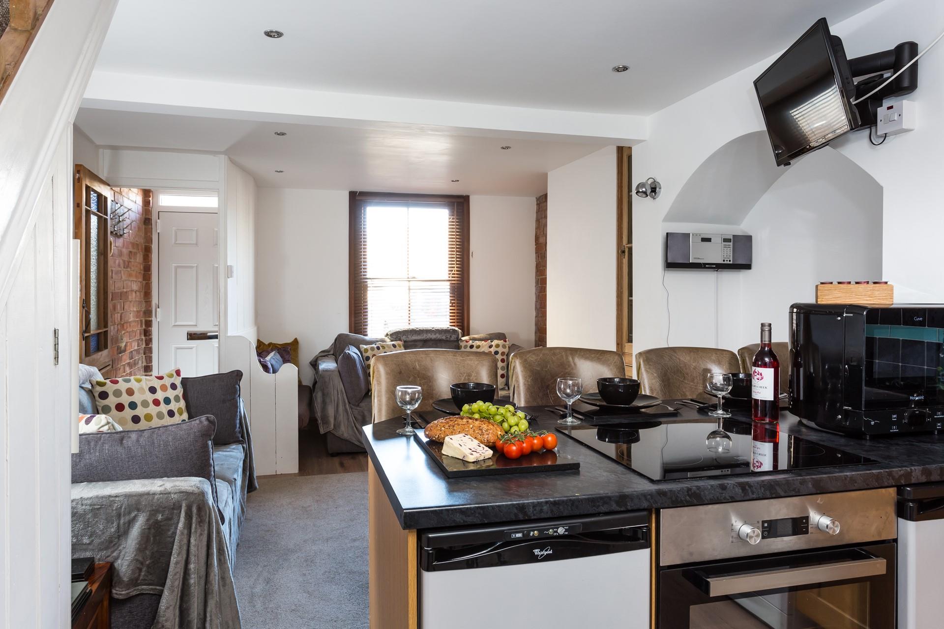 The fabulous breakfast bar allows you to enjoy meals together as a family whilst ensuring the living area remains spacious. 