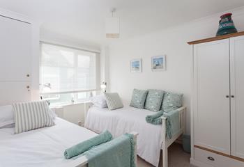 Twin beds and ample storage ensures there is room for the whole family to enjoy a break at Lamorna House.