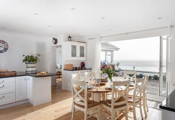 Gather together in the stunning open plan kitchen and dining area to enjoy scrumptious home-cooked meals or a takeaway! 