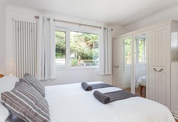 Large windows allow in plenty of natural light ensuring the bedrooms feel bright and airy.