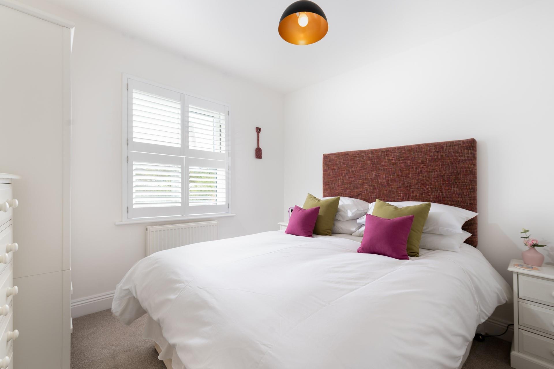 Retire in this pretty bedroom and relax for the night. 