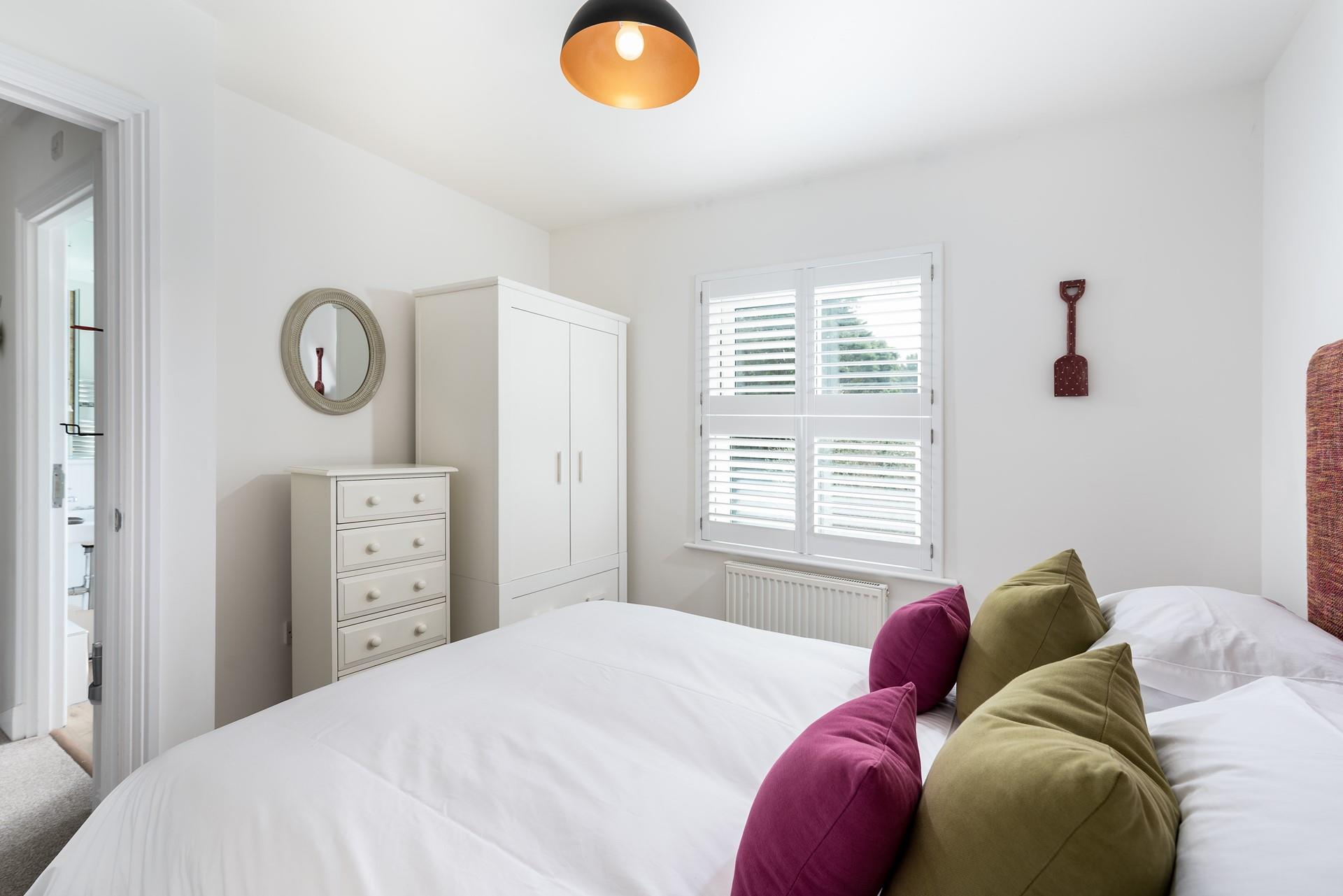 Unpack your clothes in the wardrobe then head out to the garden to start your relaxing holiday.