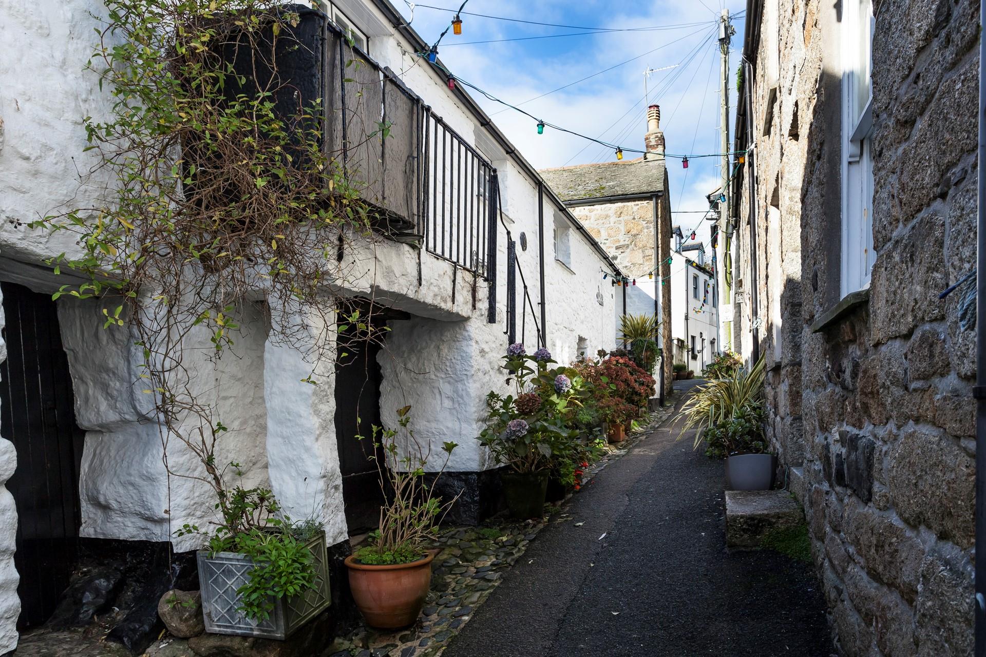Mousehole is best explored by foot with its quirky granite building and quaint streets. 