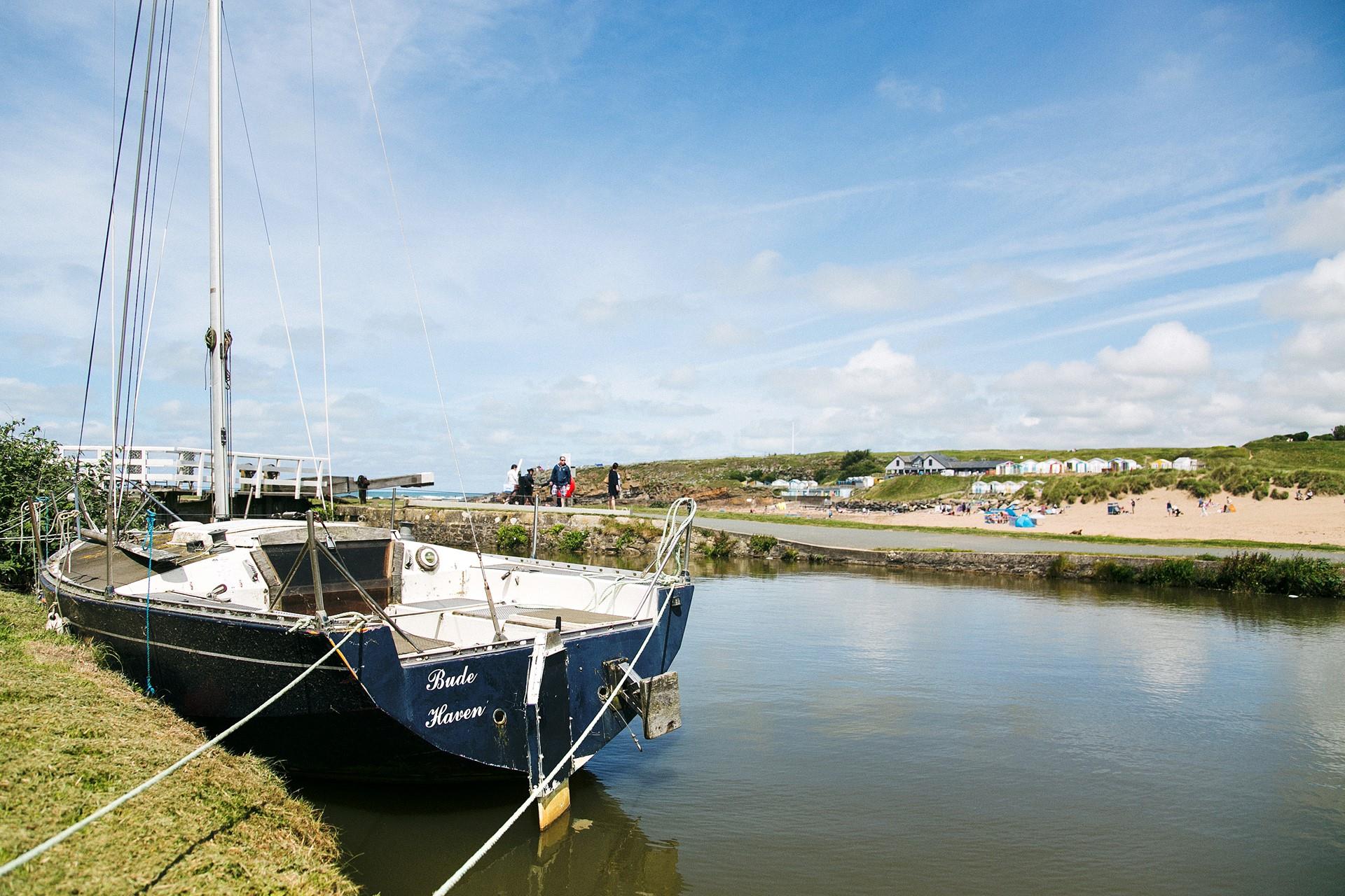 Stroll along Bude Canal and watch the boats bobbing on the water.