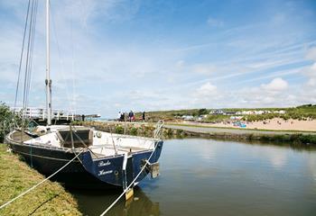 Stroll along Bude Canal and watch the boats bobbing on the water.