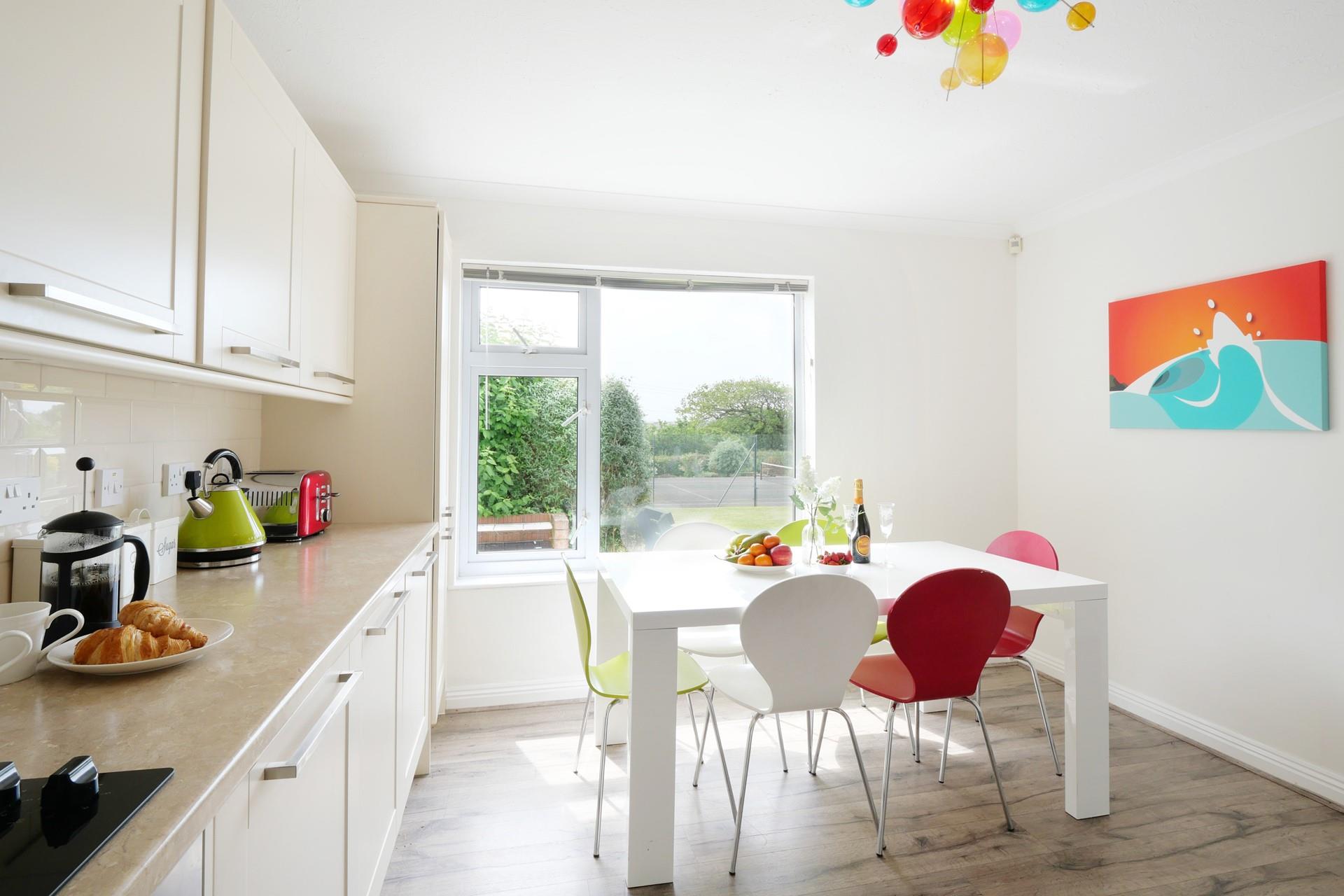 Prepare a delicious dinner in the vibrant kitchen.