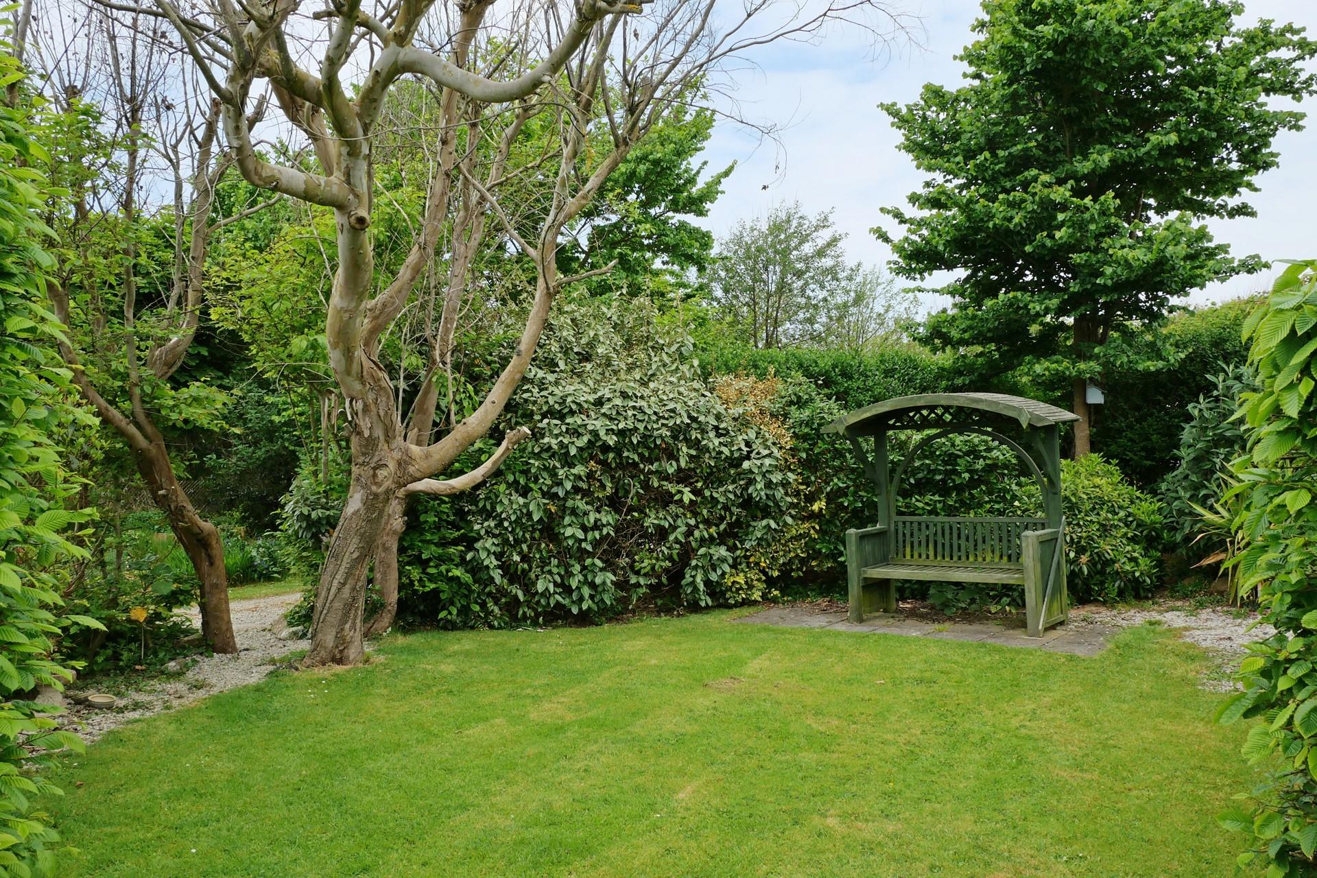 The secluded garden is the perfect space to relax and unwind in the sunshine. 