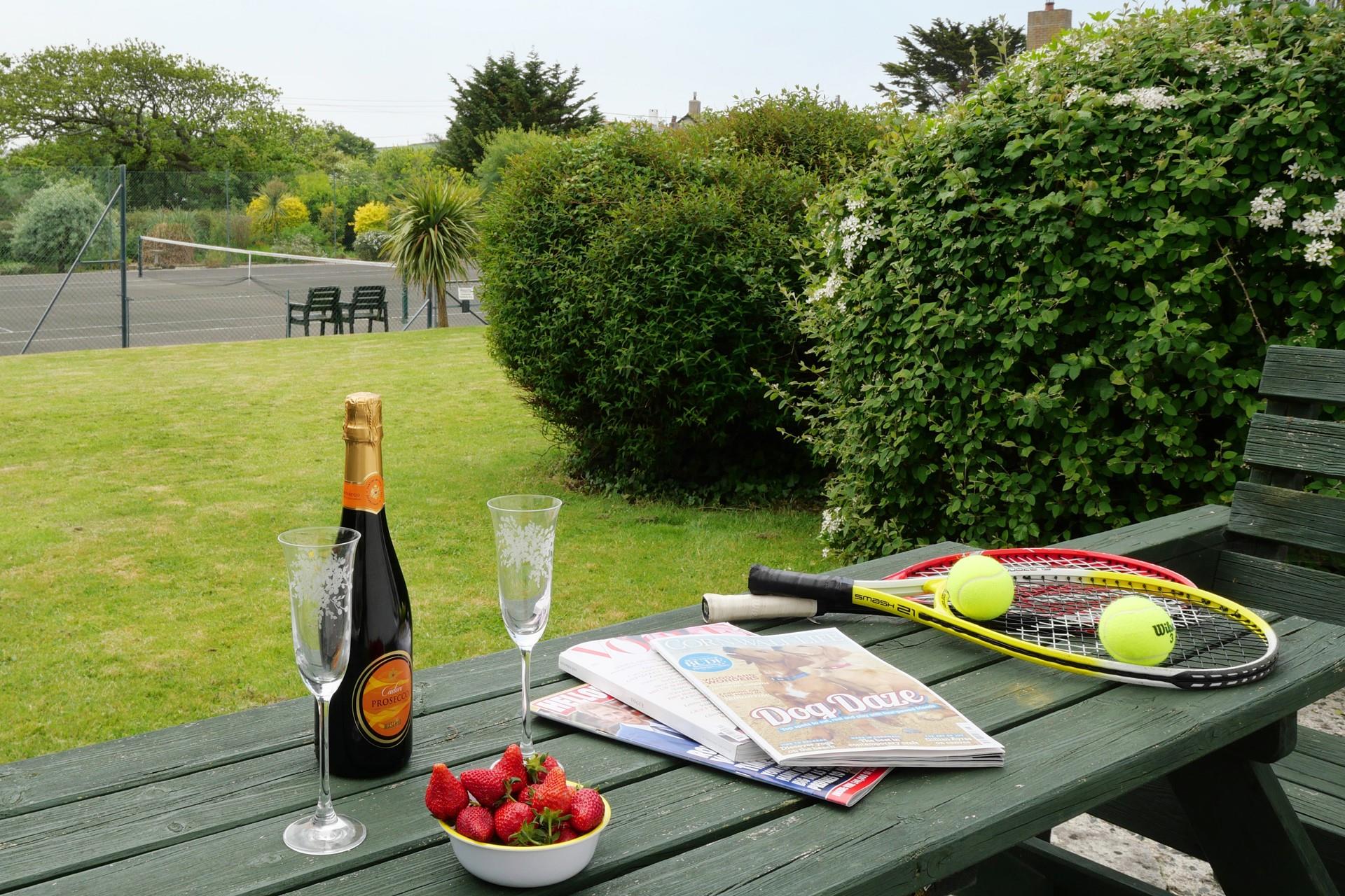 The communal tennis court is a bonus for friendly rivalry between family members.
