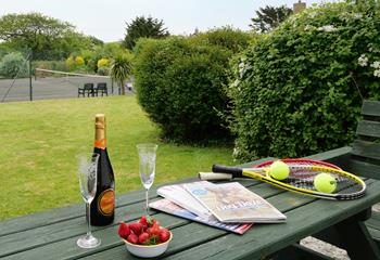 The communal tennis court is a bonus for friendly rivalry between family members.