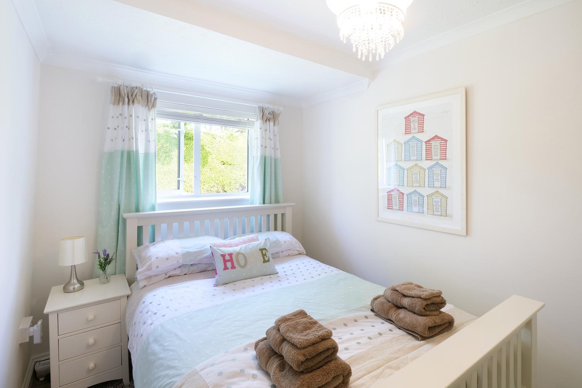 Bedroom 1 is homely and the perfect space to rest each night.