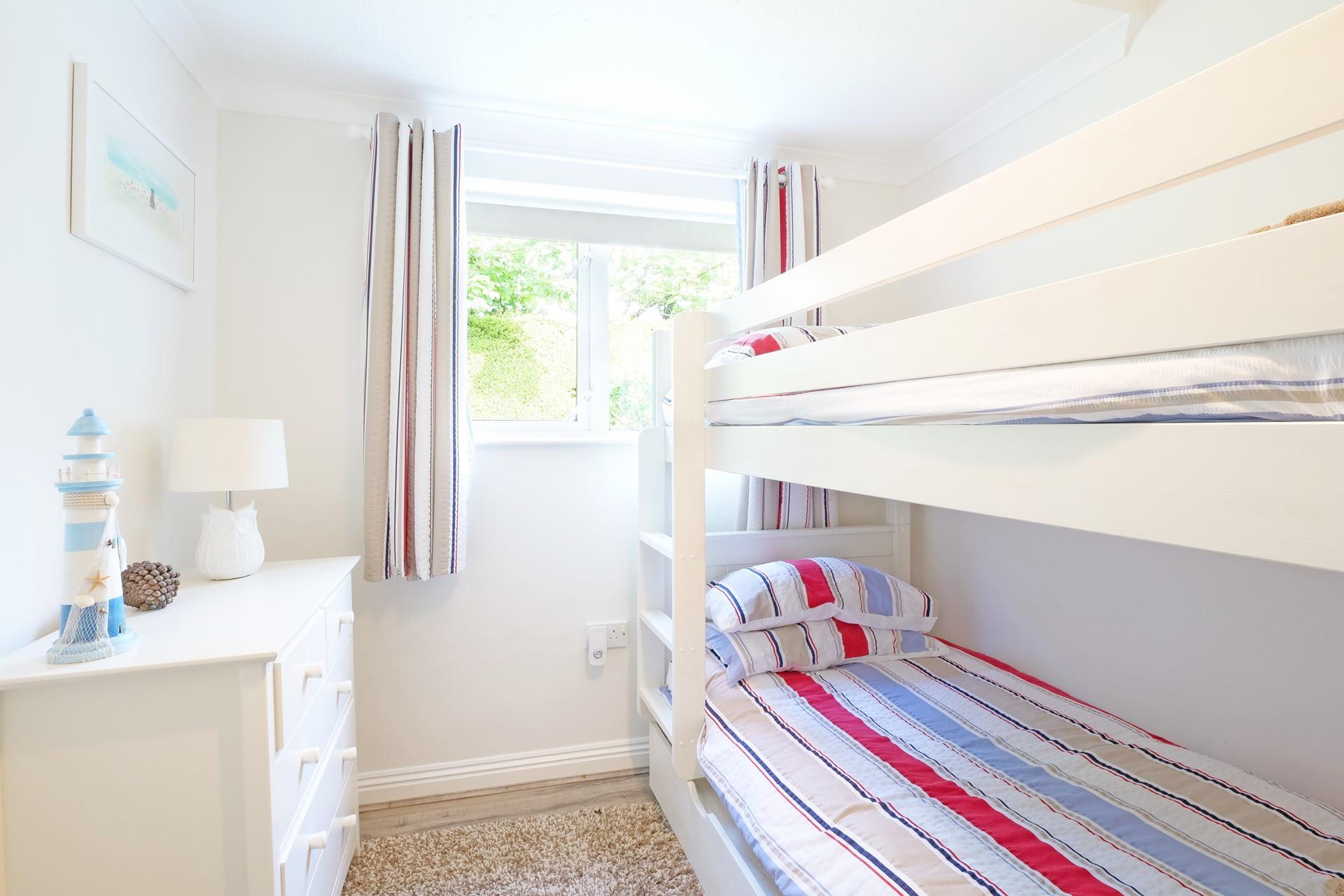 The kids will love the colourful bunk beds in bedroom 2.