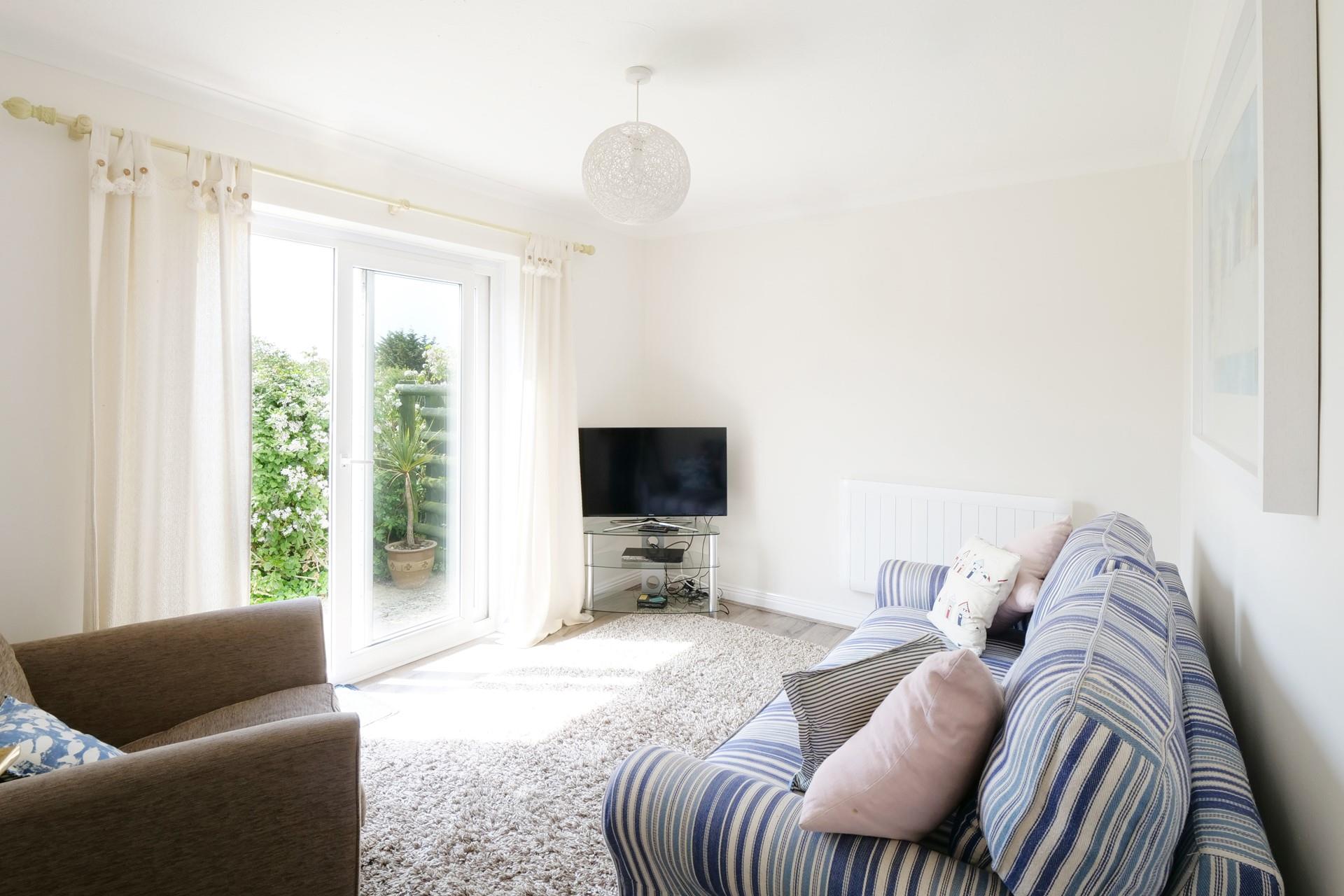 Sink into the comfortable sofa and relax after spending the day splashing in Bude Sea Pool.