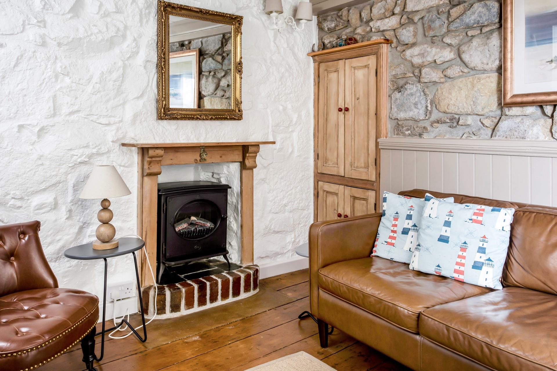 Relax on the leather sofa with a glass of wine, after a day of exploring the cobbled streets of St Ives.