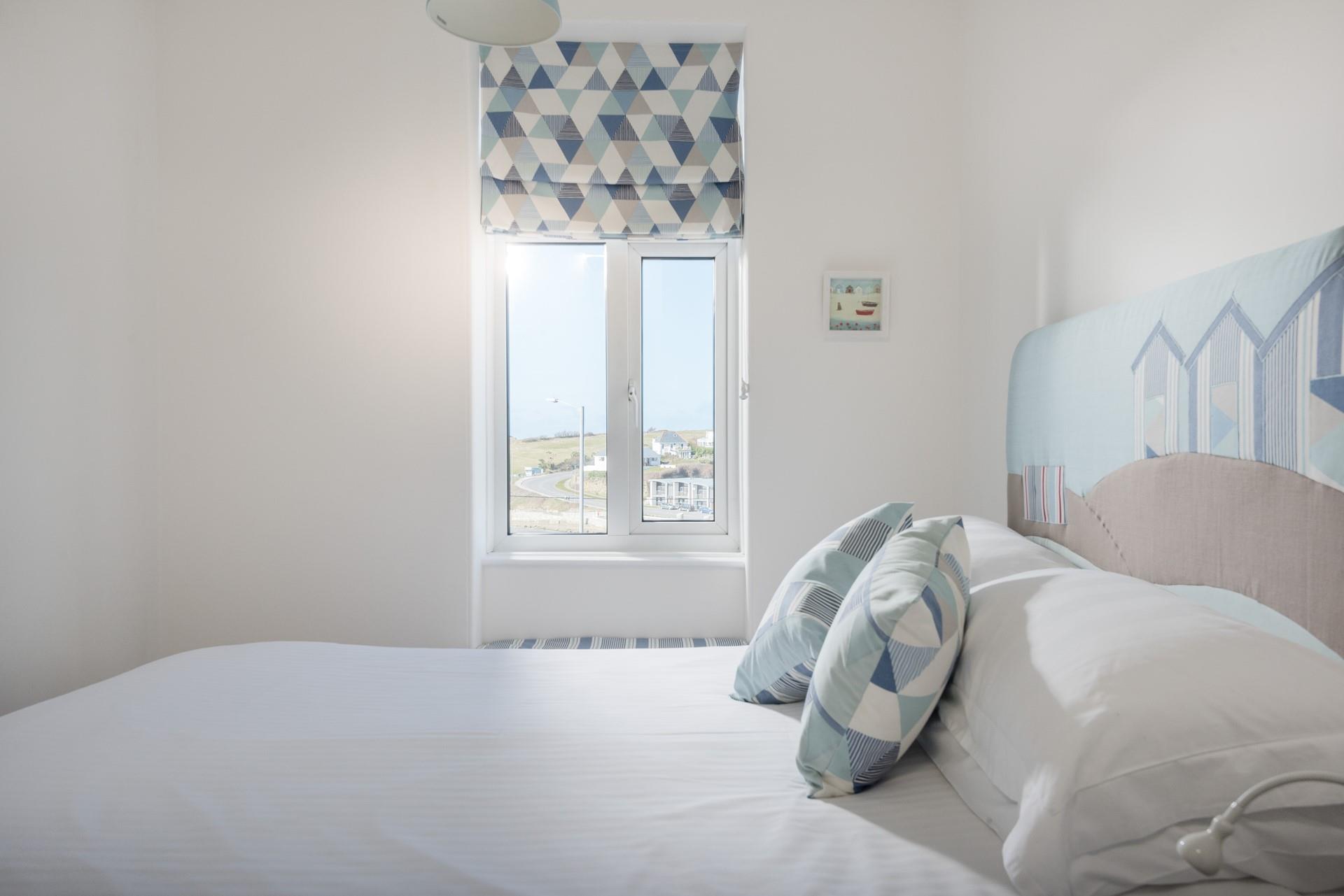 Decorated in blue hues, creating a calming atmosphere and a seaside feel.