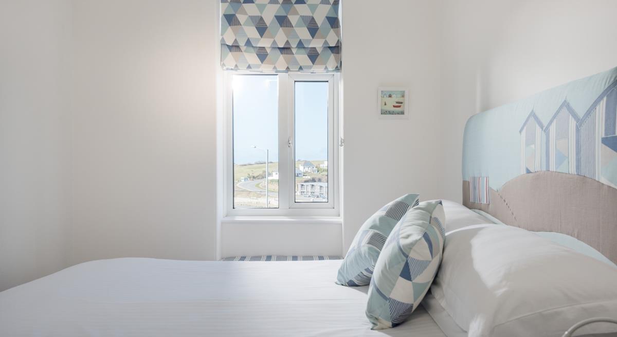Decorated in blue hues, creating a calming atmosphere and a seaside feel.