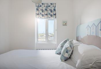 Decorated in blue hues, creating a calming atmosphere and a seaside feel.