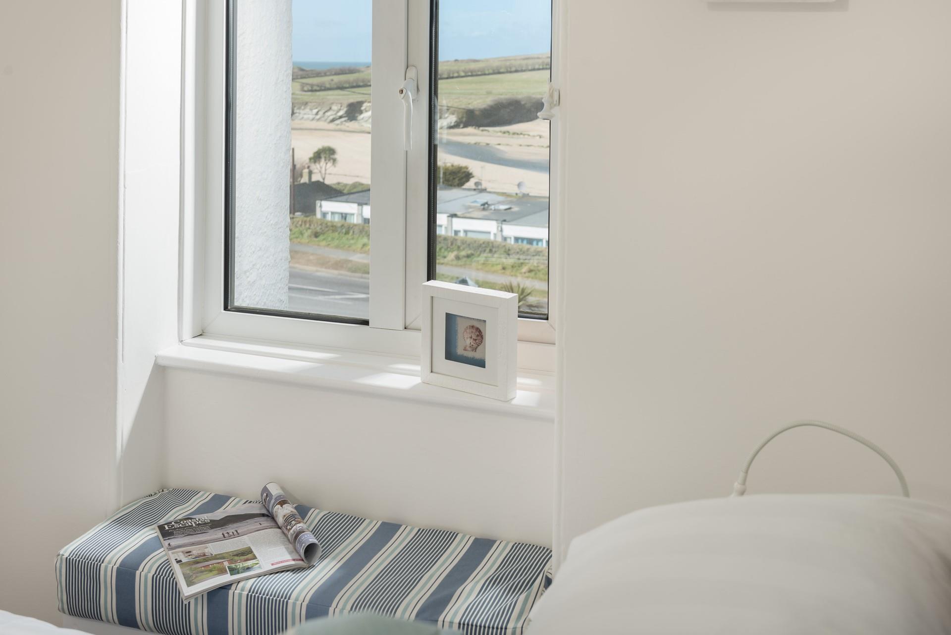 Sit in the window seat and sip on your morning coffee as you gaze out to the beach.