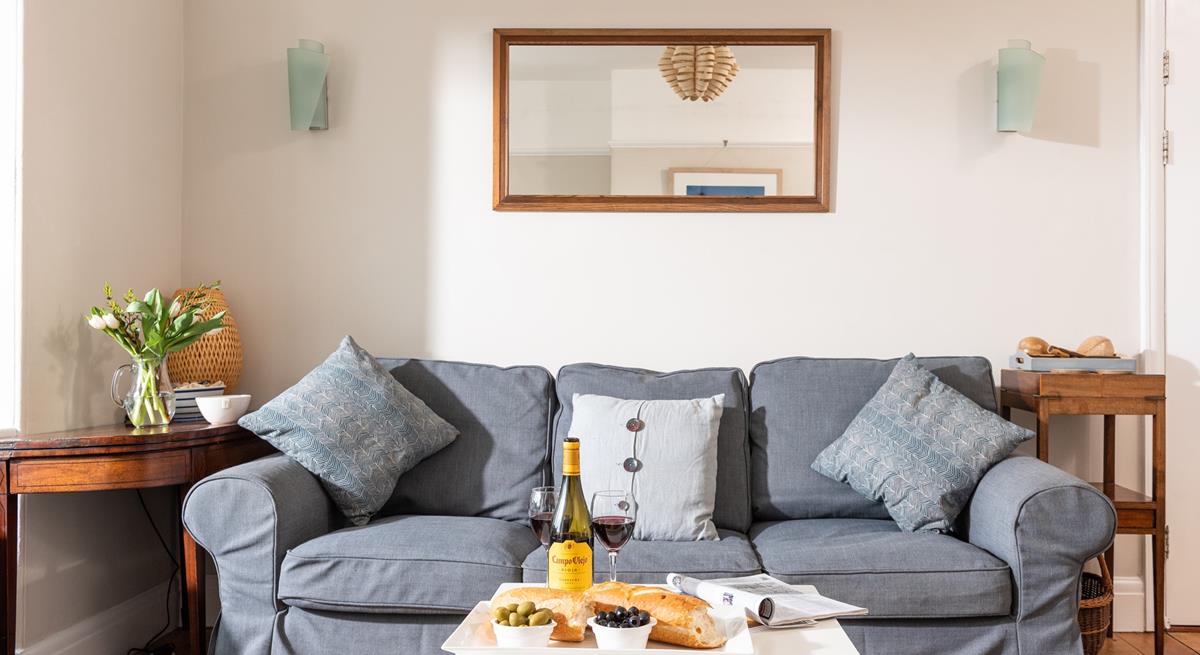 Soft, neutral tones create a calming atmosphere to relax in.