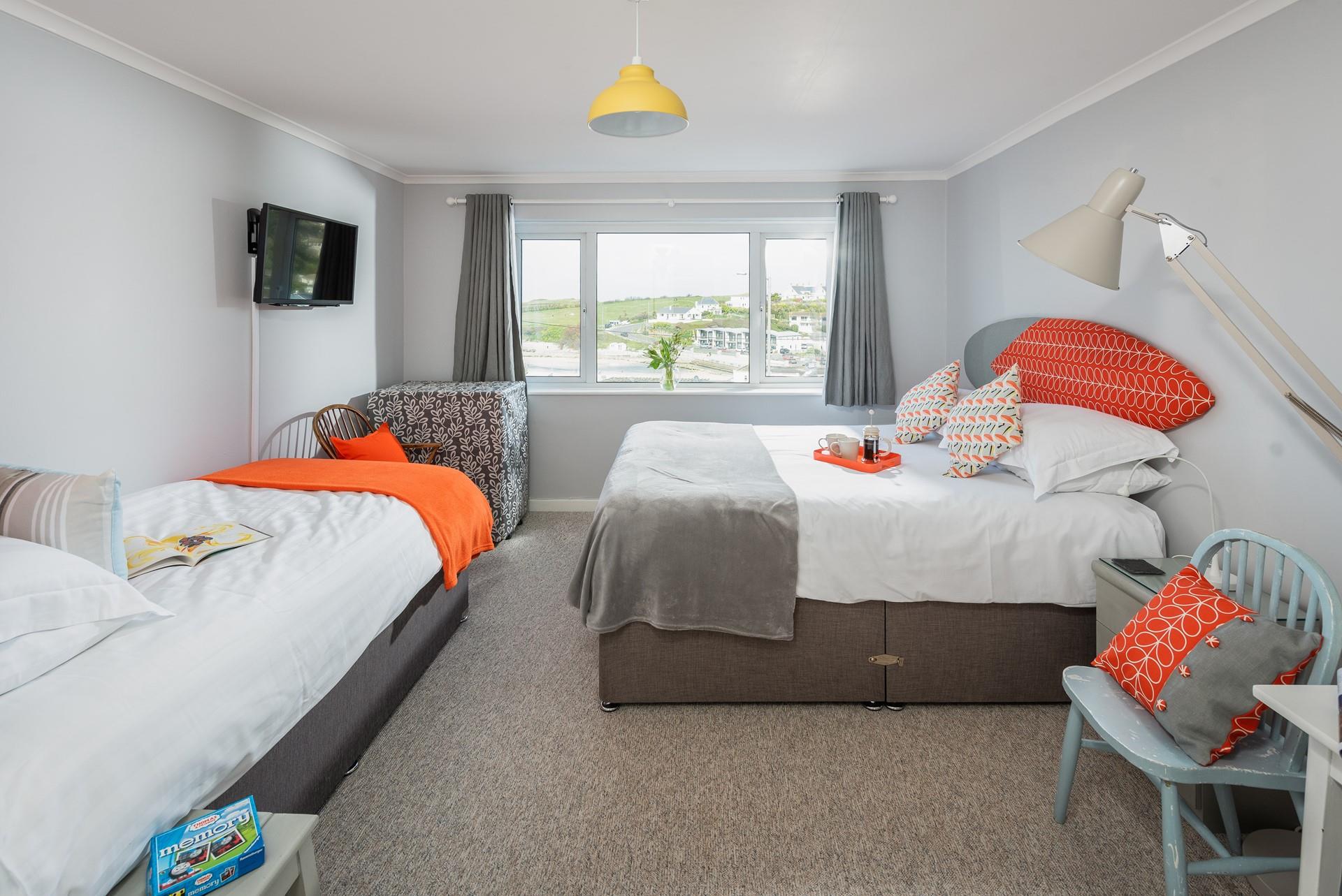 Bright surf-inspired features make this bedroom perfect for the kids!