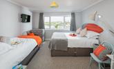 Bright surf-inspired features make this bedroom perfect for the kids! - Thumbnail Image