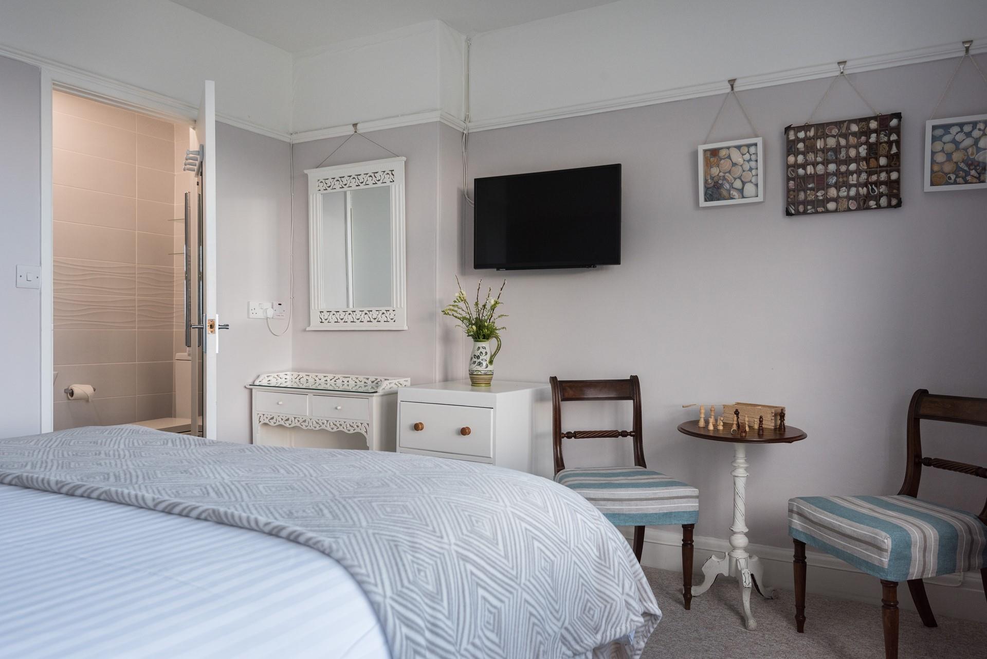 Comfortable beds, stunning seaside decor and views of the beach will ensure a fantastic night's sleep. 