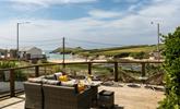 Relax on the sun deck, with views across Porth beach to Porth island. - Thumbnail Image