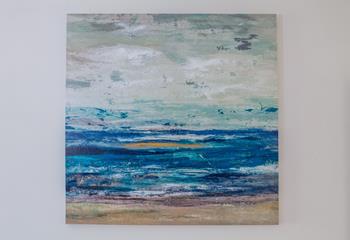 We love the coastal artwork throughout the property. 