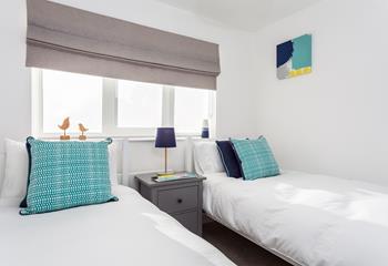 We love the fresh look of this bedroom with the splash of colour.