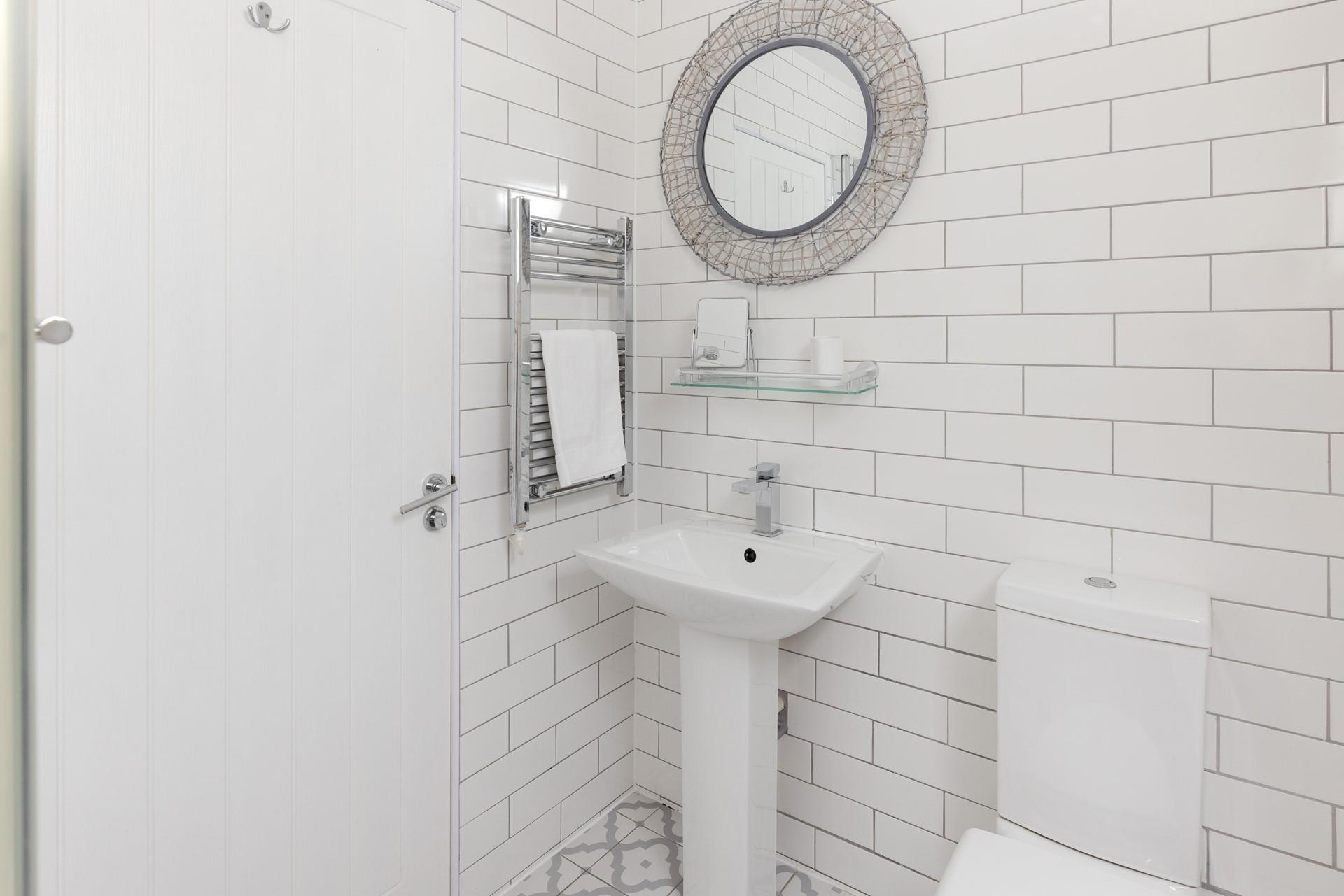 Modern and stylish, the bathroom is tastefully finished.