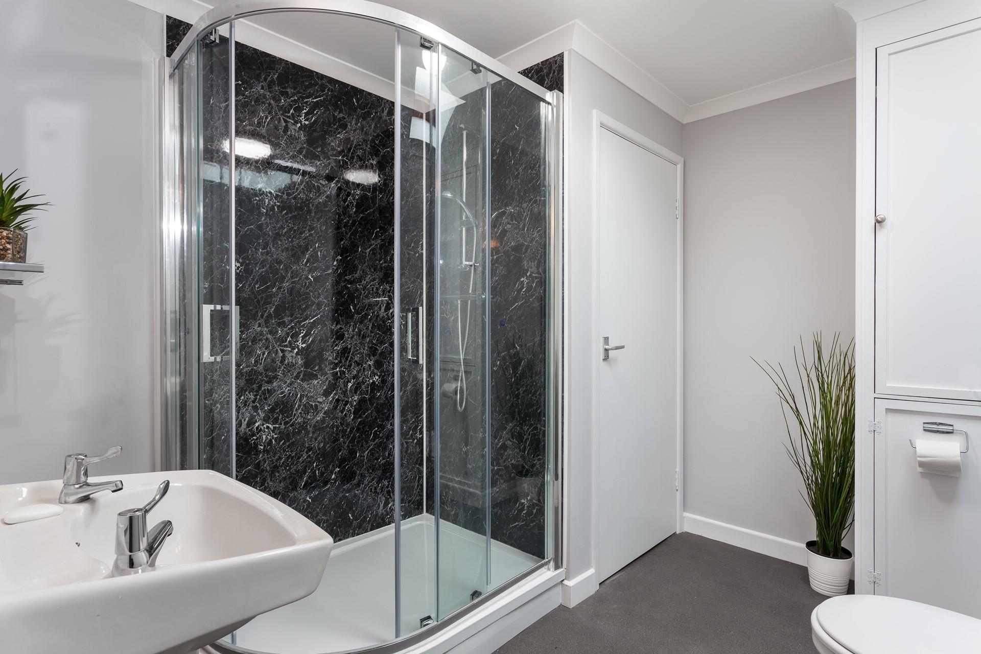 Wash the sand off and get ready for an evening drink in the nearby beer garden at The Bluff.