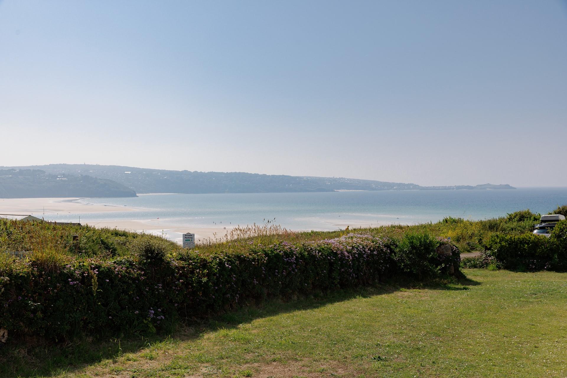 The pale golden sands and crystal clear waters of Hayle beach are a short walk away.