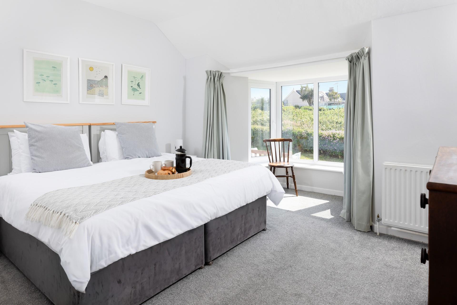 Accessed through bedroom 5, bedroom 4 is a spacious and calming haven.