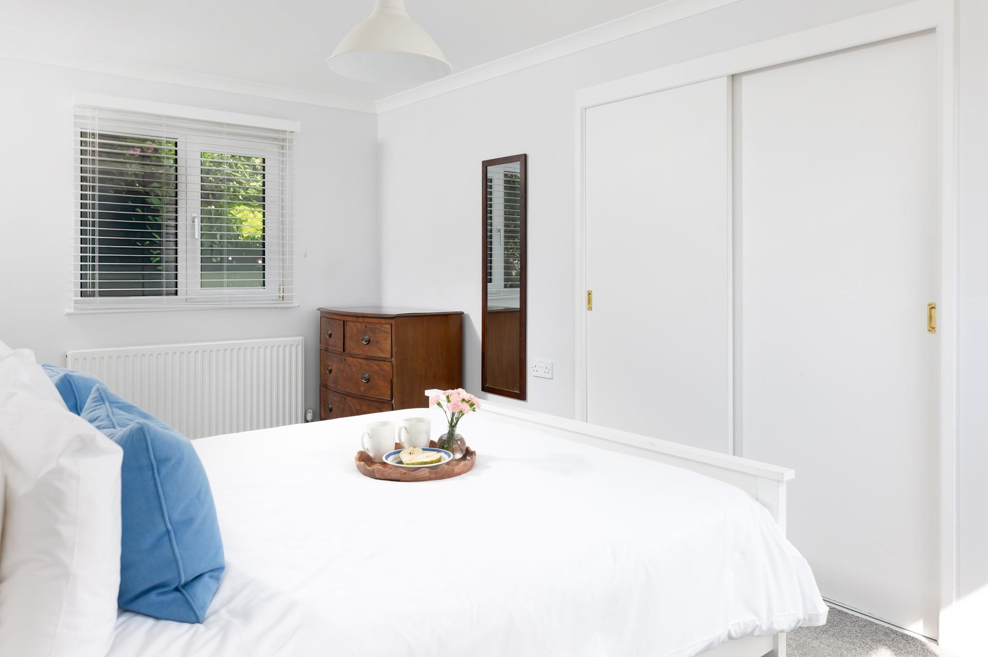 There's plenty of storage in bedroom 1's built-in wardrobe.
