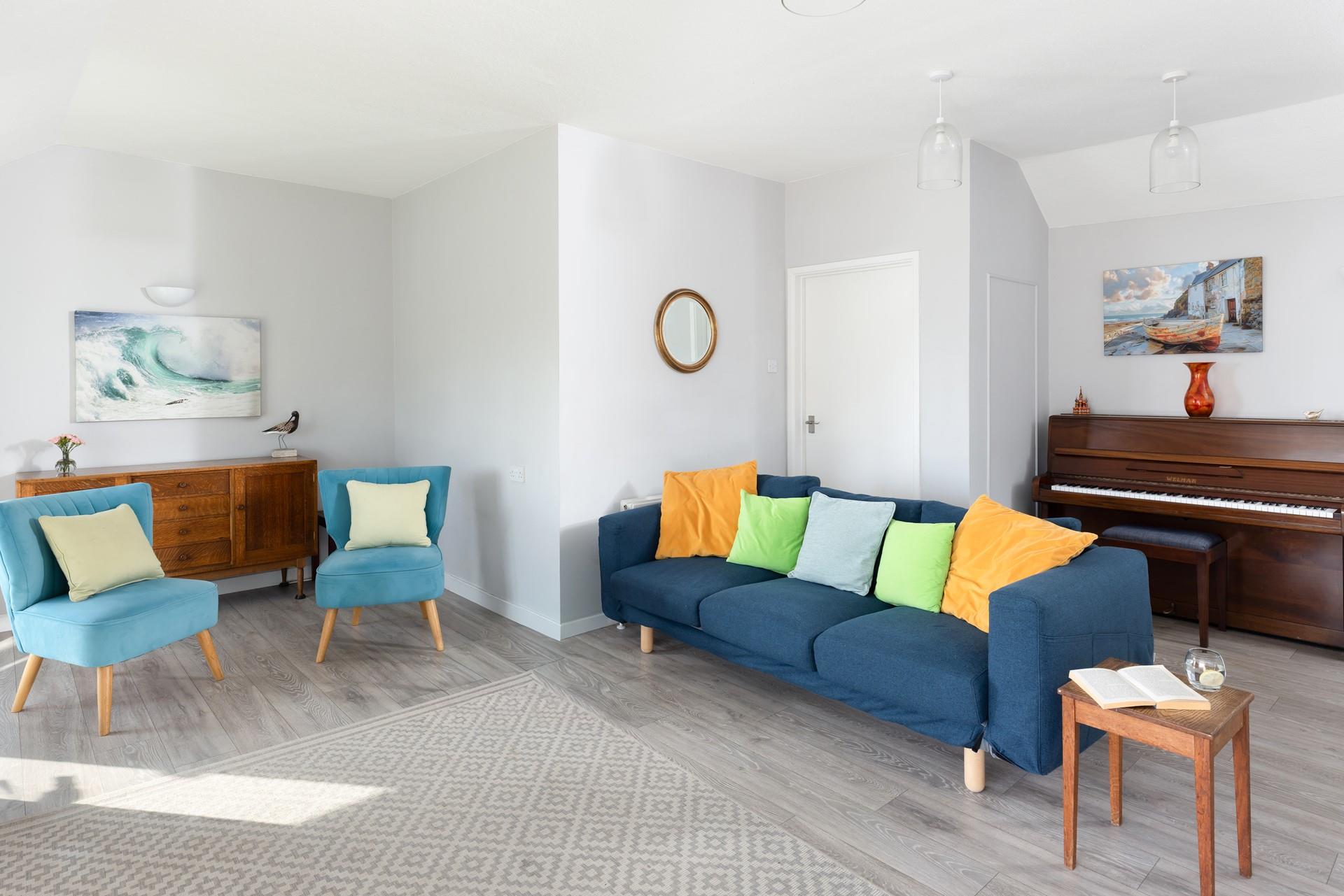 Coastal hues and pops of colour reflect the sunny beachside location.