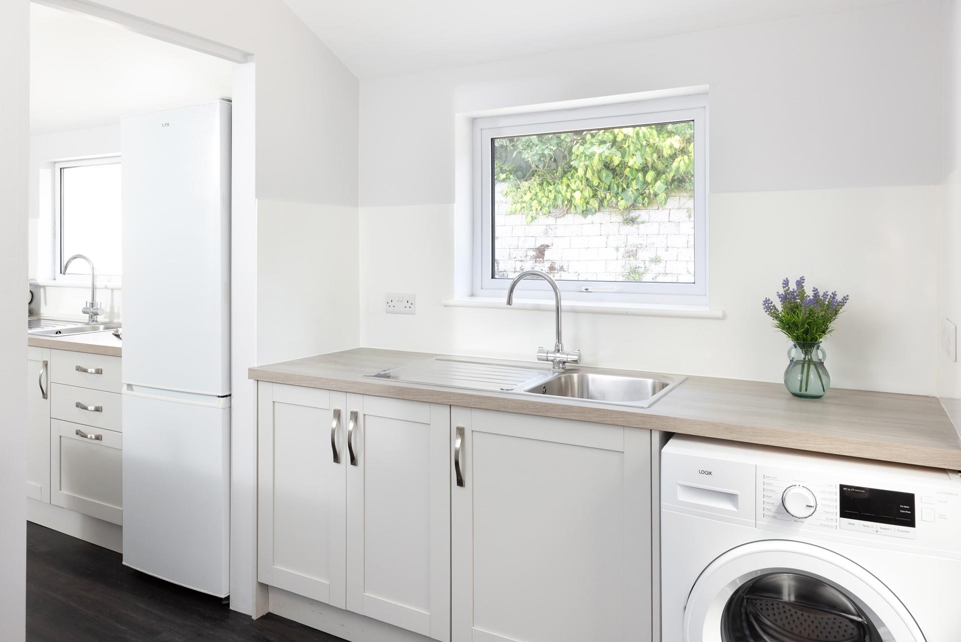 A handy washing machine makes beach days a breeze!