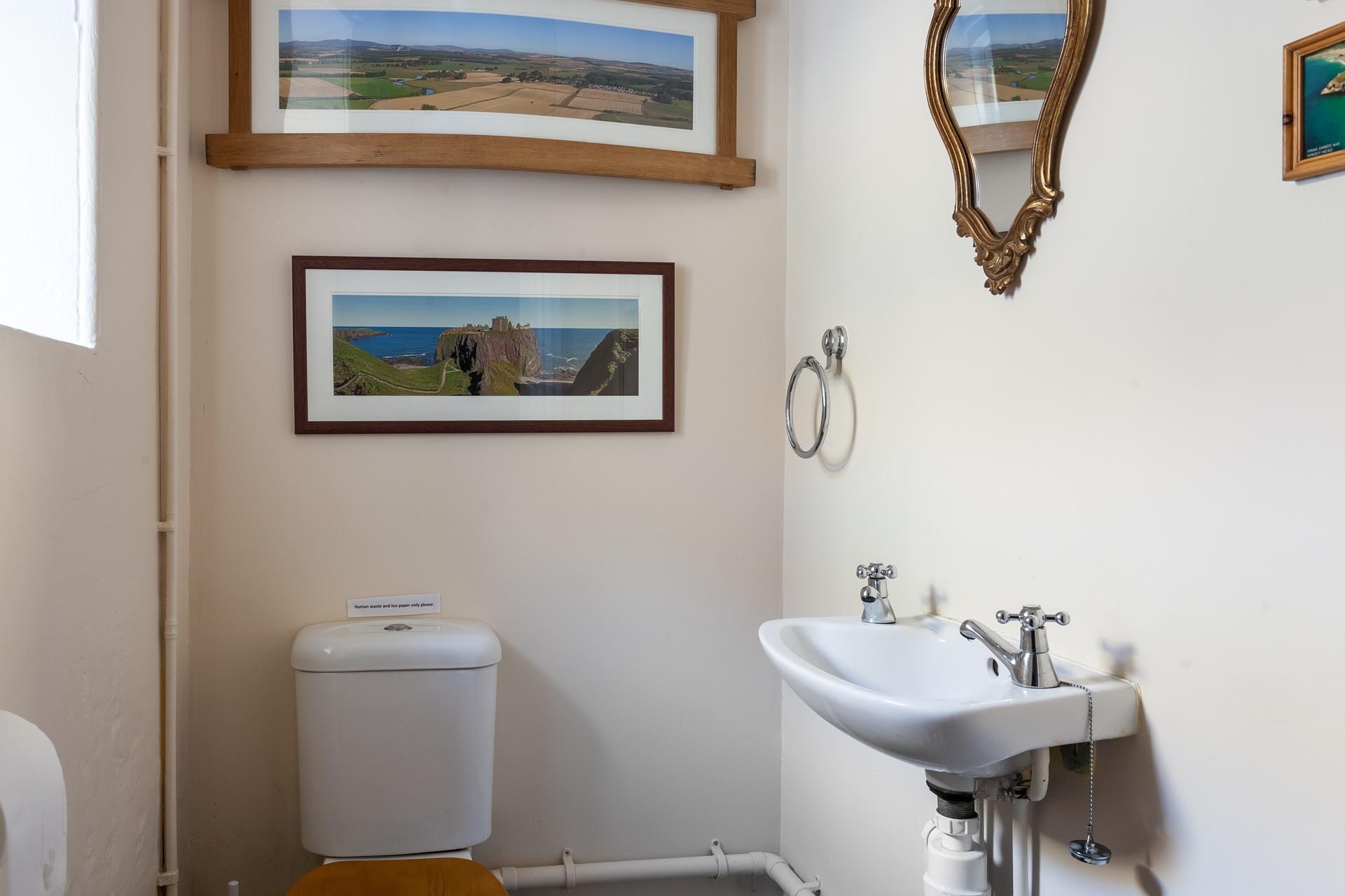 The property benefits from a handy cloakroom, ideal for washing hands before dinner.