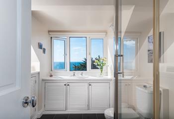 A second bathroom with glorious sea views gives everyone space and privacy to get ready.