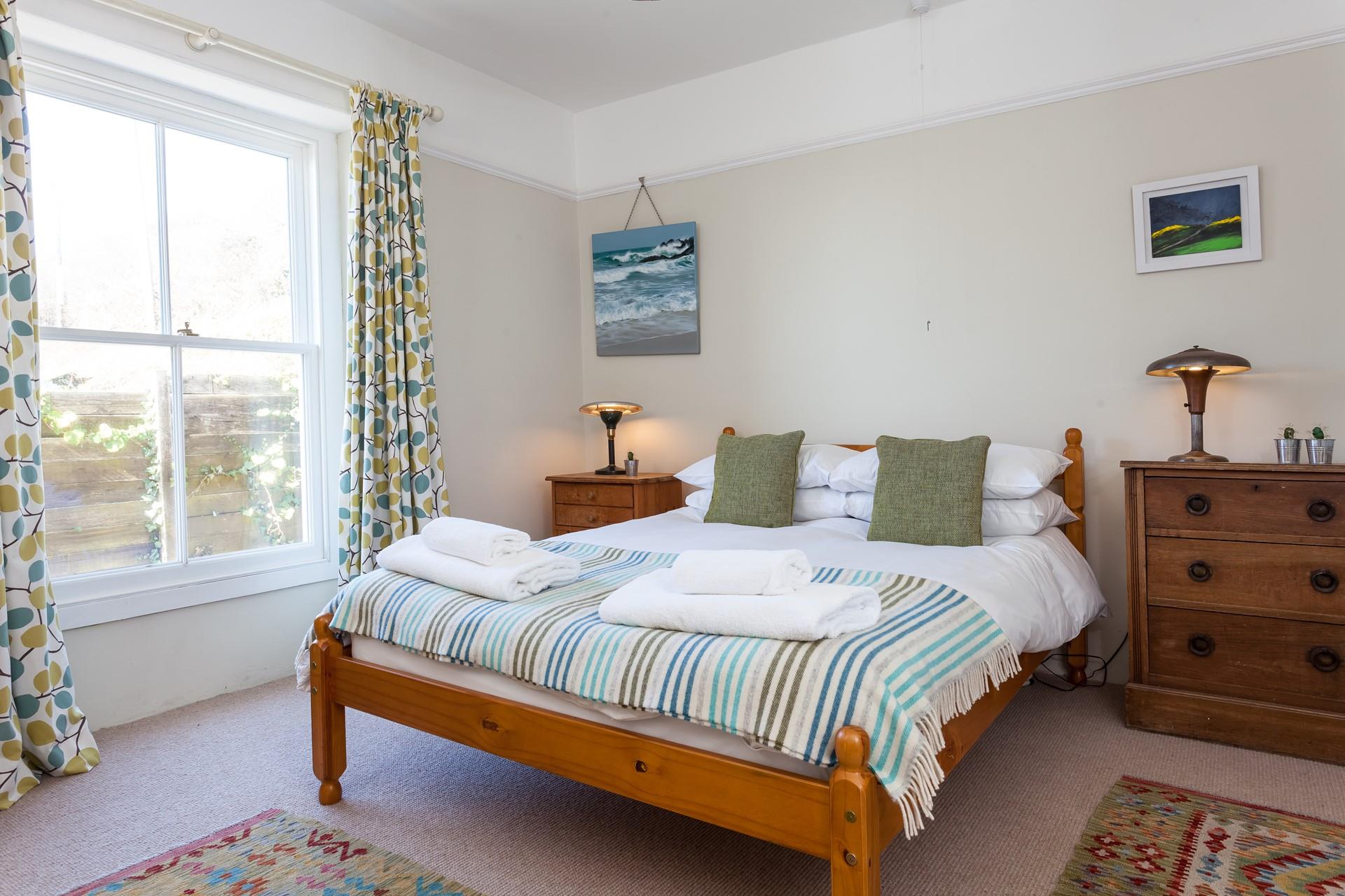 A muted colour palette has created an oasis of calm, perfect for letting you unwind and drift off to sleep.