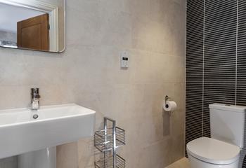 The modern en suite is perfectly spacious to get ready each day.