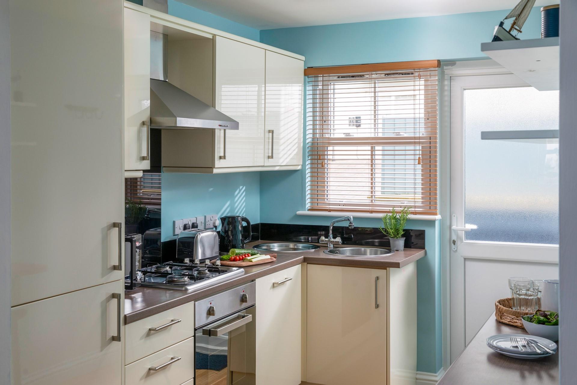 The kitchen is modern and well-equipped.