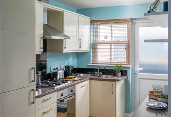 The kitchen is modern and well-equipped.