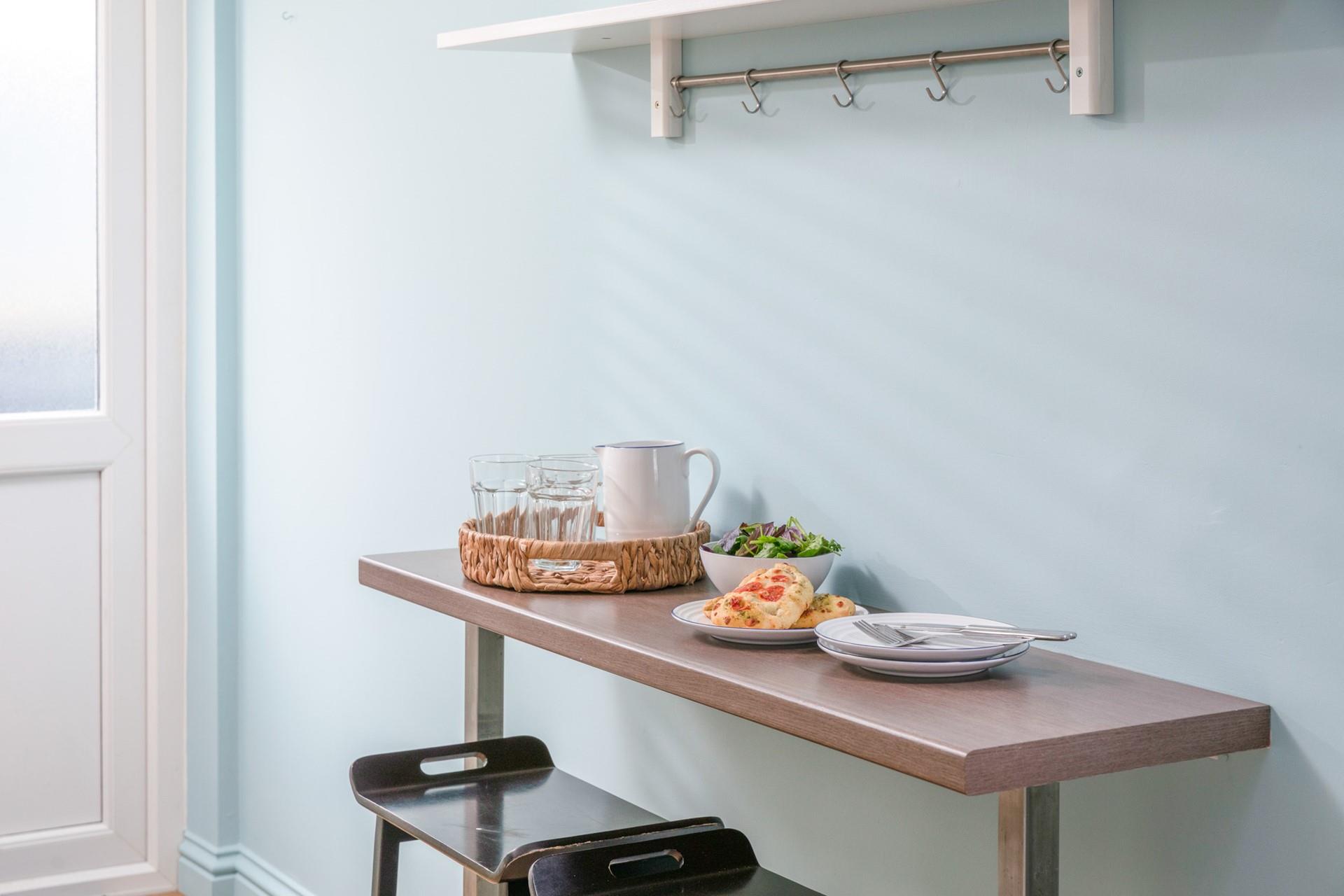 There's a handy breakfast bar in the kitchen offering extra seating.