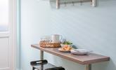 There's a handy breakfast bar in the kitchen offering extra seating. - Thumbnail Image