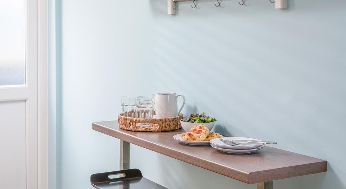 There's a handy breakfast bar in the kitchen offering extra seating.